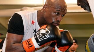 Floyd Mayweather Jr. works out with his trainer and uncle, Roger Mayweather, at the Mayweather Boxing Club.Ethan Miller/Getty Images