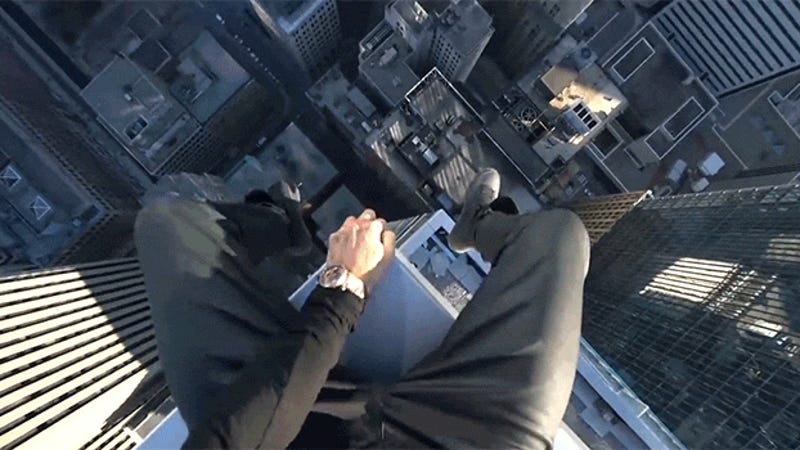 photo of Watching This Dude Sit and Spin on the Edge of a Building Is So Nerve Wrecking image