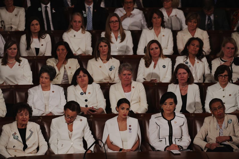 Female lawmakers dressed in white watch as President Donald Trump delivers the State of the Union address in the chamber of the U.S. House of Representatives at the U.S. Capitol Building on February 5, 2019 in Washington, DC. A group of female Democratic lawmakers chose to wear white to the speech in solidarity with women and a nod to the suffragette movement.