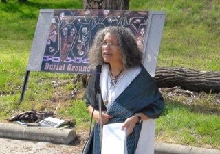 Ana Edwards at protest against use of an African burial ground as a parking lot. (Jonathan Pourzal)