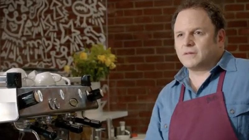 Illustration for article titled Jason Alexander makes latte art for a Baywatch babe in a confounding new Nickelback video