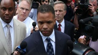 Former Democratic congressman Jesse Jackson Jr. leaves a federal courthouse in 2013 after being sentenced to 30 months in prison.Mark Wilson/Getty Images