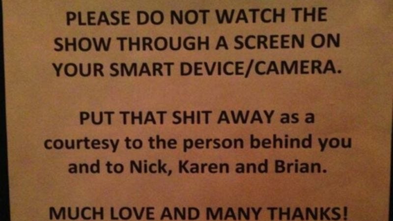 Illustration for article titled Yeah Yeah Yeahs urge fans to put cameras and cell phones away, not watch shows "through a screen"