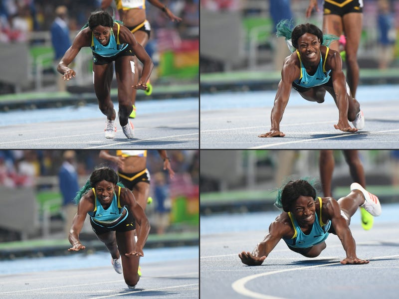 This combination of pictures created Aug. 15, 2016, shows Bahamas' Shaunae Miller diving to cross the finish line to win the women's 400-meter final during the Rio de Janeiro 2016 Olympic Games on Aug. 15, 2016.OLIVIER MORIN/AFP/Getty Images