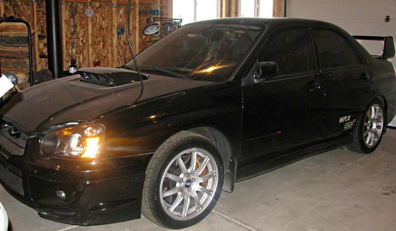 Illustration for article titled Why Buy A Toyota Yaris When You Can Get This Subaru WRX STi For Less?