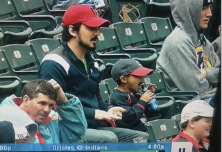 Illustration for article titled Here's A Photo Of A Very Young Indians Fan About To Pound A Bottle Of Bud Light