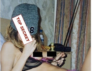 Illustration for article titled Russian Spy Beauty Liked Sex Toys, Posing For Pictures, Benny Hill