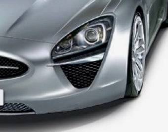 Illustration for article titled 2013 Jaguar XE: Biggest. Cat's Eyes. Ever.