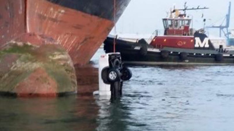 Illustration for article titled Cargo Fail Leaves Truck Dangling Off A Ship Like Bait On A Fishing Line