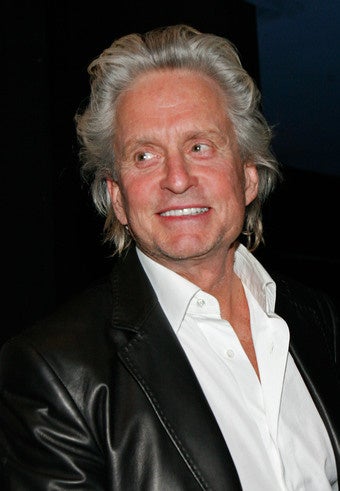 Illustration for article titled Michael Douglas Will Play Liberace; Angelina Takes Zahara Back To Ethiopia