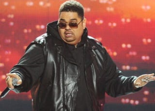 Illustration for article titled Heavy D's Family: His 'Bear Hugs' Will Be Missed