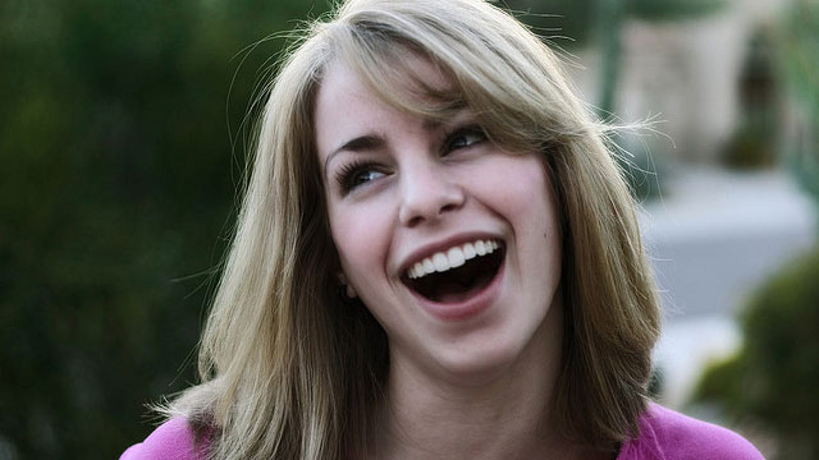 More Photogenic by Knowing How Genuine Facial Expressions Feel