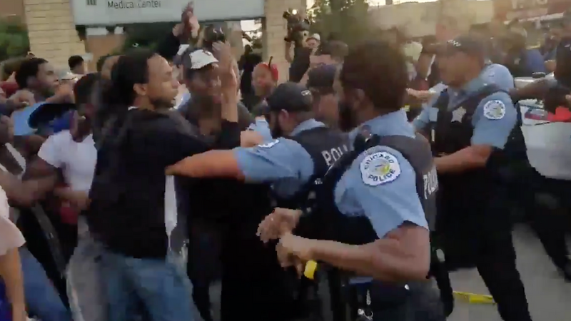 Confrontation between protesters and Chicago police, July 14, 2018.
