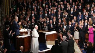 Pope Francis is applauded by members of Congress as he arrives Sept. 24, 2015, to speak during a joint meeting of Congress in the House Chamber of the U.S. Capitol in Washington, D.C. Pope Francis is the first pope to address a joint meeting of Congress.Win McNamee/Getty Images