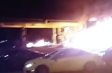 A Milwaukee gas station burns after police kill black man Aug. 13, 2016.Twitter screenshot