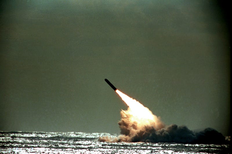 The U.S. Navy successfully launches a Trident II, D-5, Performance Evaluation Missile from the submerged submarine USS Tennessee in this 1989 file photo. The missile was launched despite attempts by the Greenpeace organization to stop the operation. (AP Photo/Phil Sandlin)