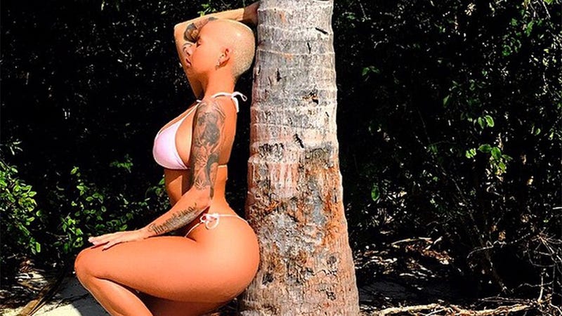 Illustration for article titled Amber Rose's Butt Now Does Everything in a String Bikini
