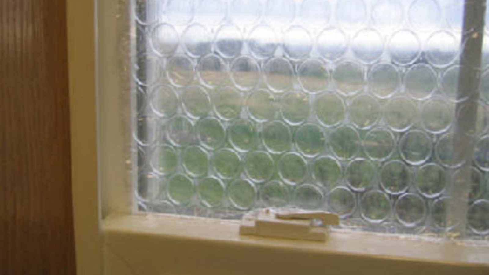 Hang Bubble Wrap as Temporary Curtains