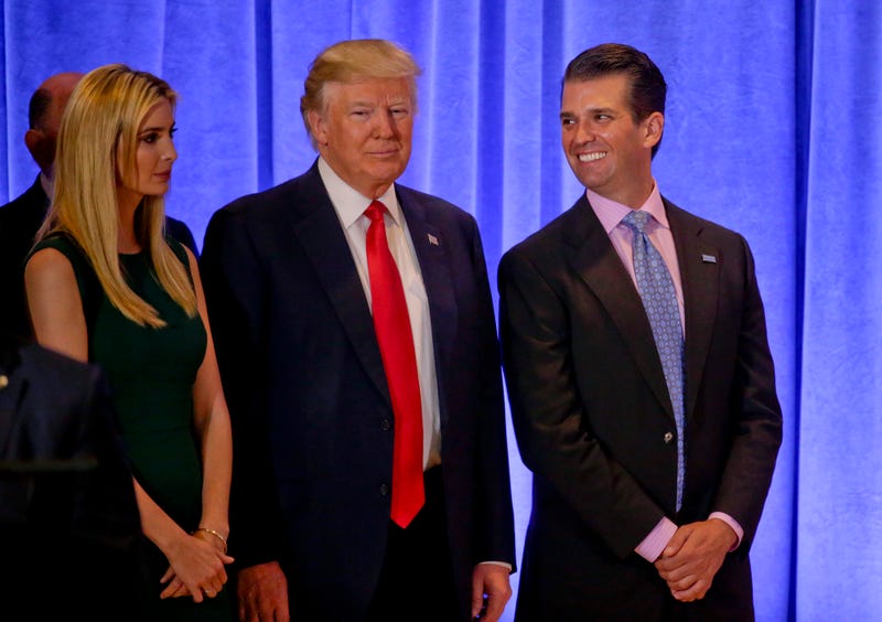 Donald Trump Jr. (right) with then-President-elect Donald Trump and Ivanka Trump in New York City on Jan. 11, 2017 (Seth Wenig/AP Images)