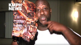 Robert Wright proudly holding the slab of ribs he was able to save from an apartment fire early Tuesday morning. KMPH News Screenshot
