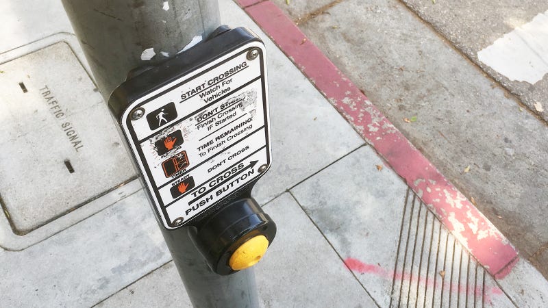 Illustration for article titled The Crosswalk Button Must Be Pressed Many Times