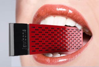 Illustration for article titled 34 Inappropriately Sexy Gadget Ads