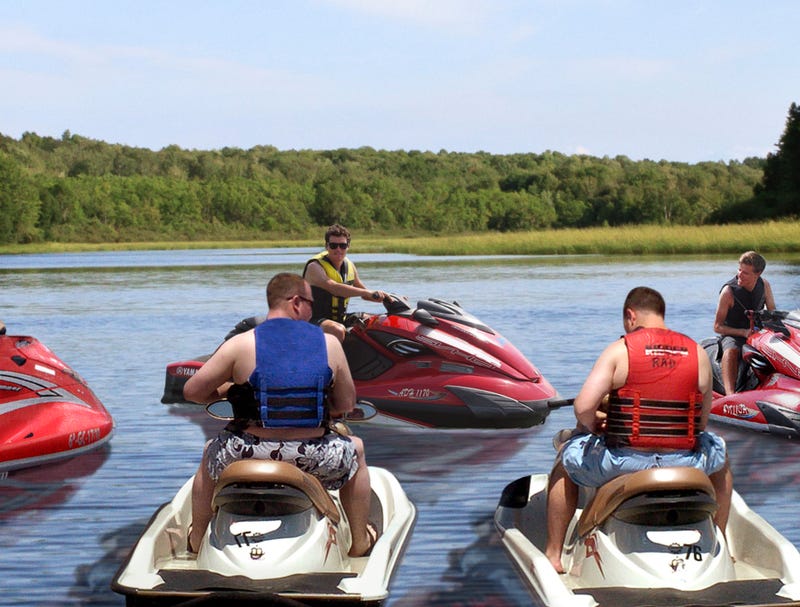 Leader Of Sea-Doo Riders Holds Court In Middle Of Lake