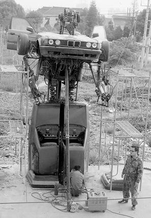 Illustration for article titled Home-Made Autobots Protect Chinese Scrap Yard From Decepticon Invasion