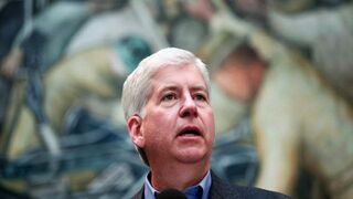 Michigan Gov. Rick Snyder speaks at a press conference at the Detroit Institute of Arts on June 9, 2014, in Detroit.  Bill Pugliano/Getty Images