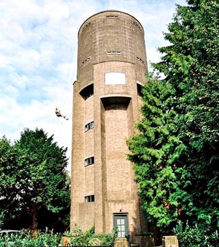 Illustration for article titled Water Tower Apartment Looks Great Inside, Misses Fiery Magical Eye on Top