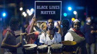 Demonstrators marking the one-year anniversary of the shooting of Michael Brown protest along West Florissant Street Aug. 10, 2015, in Ferguson, Mo.Scott Olson/Getty Images