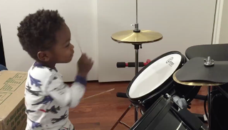 One-year-old L.J. on the drumsFacebook