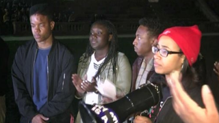 University of Virginia students rally in Charlottesville, Va., to protest the recent beating and arrest of Martese Johnson (far left) by Virginia Department of Alcoholic Beverage Control officers early Wednesday morning. NBC 29 screenshot