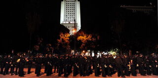 Police raid Occupy L.A. site. (Getty)