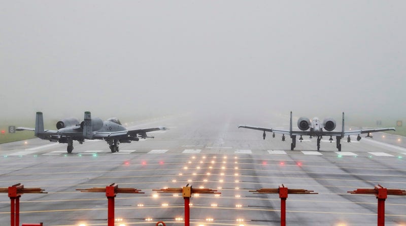 US Air Force A-10 attack aircraft wait to take off on the runway at the Osan US air base in Pyeongtaek, South Korea on August 10, 2017 (Hong Ki-won/Yonhap via AP)