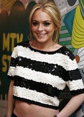 Illustration for article titled No Surprise Here: Lindsay Lohan's Boy-Toy A Total Tool
