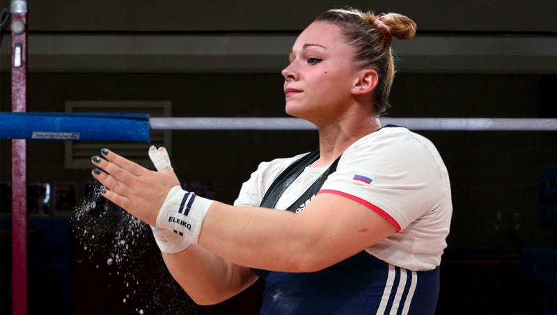 Illustration for article titled Russian Olympic Coach Gently Breaks News To Hulking 200-Pound Gymnast That She Won’t Be Competing In South Korea