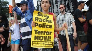 Demonstrators protest outside the Ferguson Police Department in Missouri during the National March on Ferguson Aug. 30, 2014.Michael B. Thomas/AFP/Getty Images