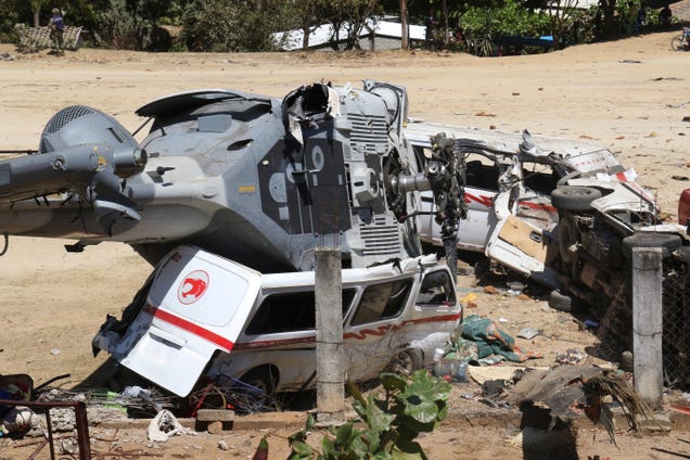 Helicopter Crashes Into Field Killing 13 People On The Ground – Cars