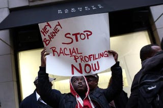 Tyreik Jackson protests outside Barneys New York’s flagship store, accusing the retailer of racial profiling, on Oct. 30, 2013, in New York City. Andrew Burton/Getty Images