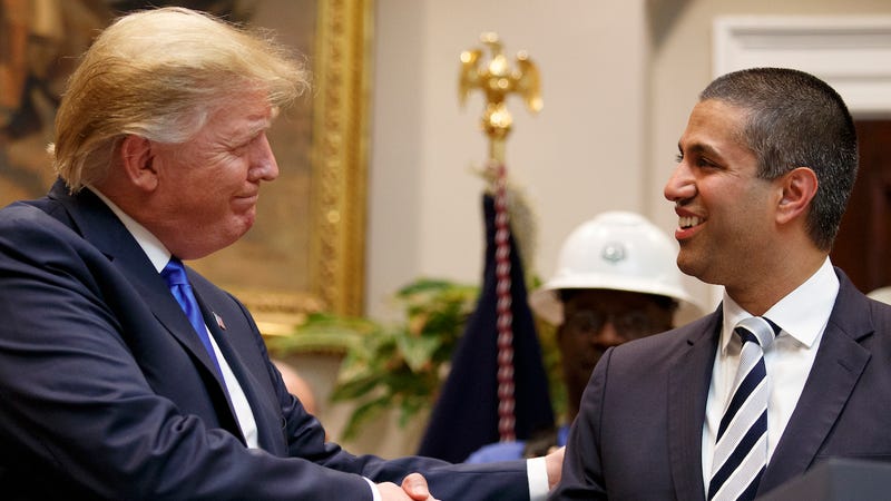 President Donald Trump shakes his hand to FCC chair Ajit Pai in White House April 12, 2019