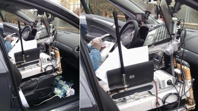 Illustration for article titled This Man Was Busted On The Autobahn With The Craziest Mobile Office We've Ever Seen