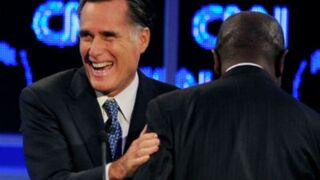 Rick Perry hugs Herman Cain. (Getty Images)