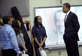 President Obama meets with students. (Getty Images)