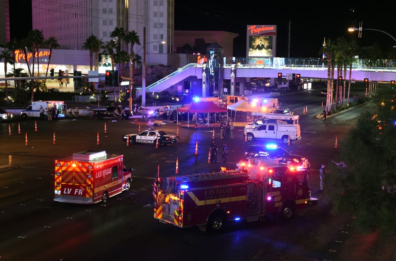 Police and rescue personnel gather at the intersection of Las Vegas Boulevard and Tropicana Avenue after a reported mass shooting at a country music festival on Oct. 2, 2017, in Las Vegas. (Ethan Miller/Getty Images)