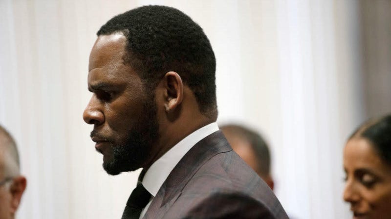 R. Kelly appears at a court hearing in Chicago June 26, 2019, on state charges he faces involving allegations of multiple sex crimes. Now, Kelly faces additional federal charges.