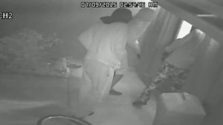 Surveillance footage shows three masked men breaking into the home of a Bradenton, Fla., couple July 9, 2015.YouTube screenshot