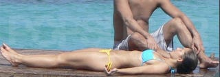 Illustration for article titled The Derek-Jeter-Hits-The-Beach-With-A-Starlet Photos Will Make You Miserable