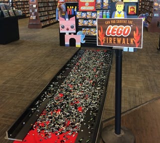Illustration for article titled Nobody can survive walking barefoot on the diabolical Lego Firewalk