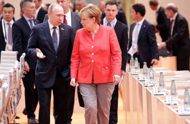 German Chancellor Angela Merkel and Russian President Vladimir Putin attend the first session of the G-20 summit July 7, 2017, in Hamburg, Germany. (Thorsten Gutschalk-Pool/Getty Images)